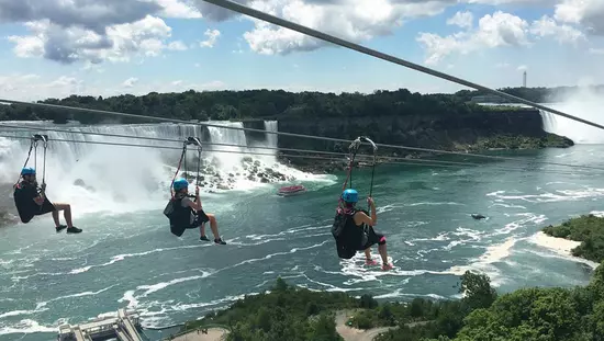 People enjoying a day ziplining over Niagara Falls